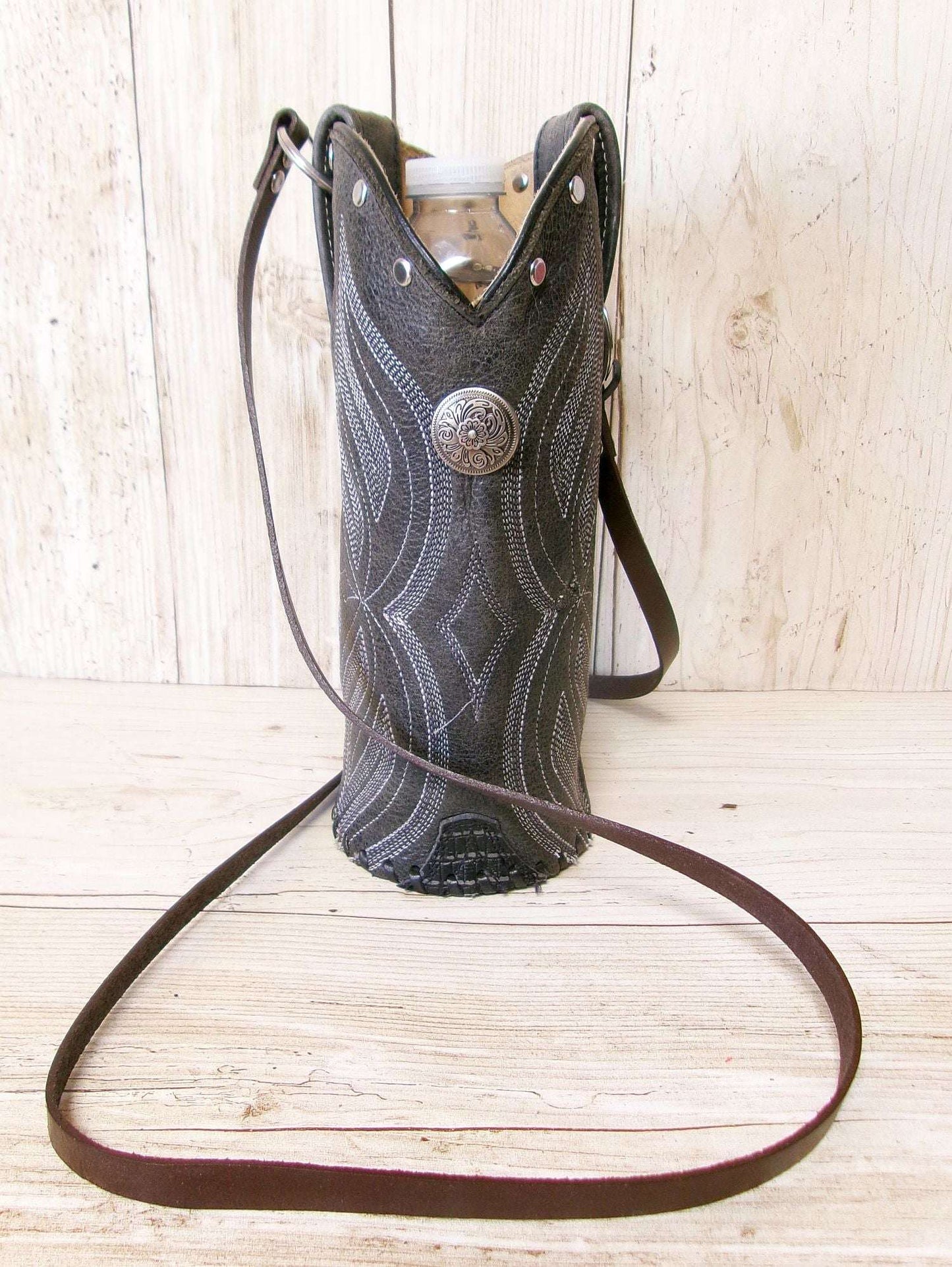 Cowboy Boot Wine Water Tote WA53 handcrafted from cowboy boots. Shop Wine Carrier Bags at ChrisThompsonBags.com and buy the best ["Bottle","Caddy","Crossbody","Holder","Tote","Water","Wine"] at Chris Thompson Bags.