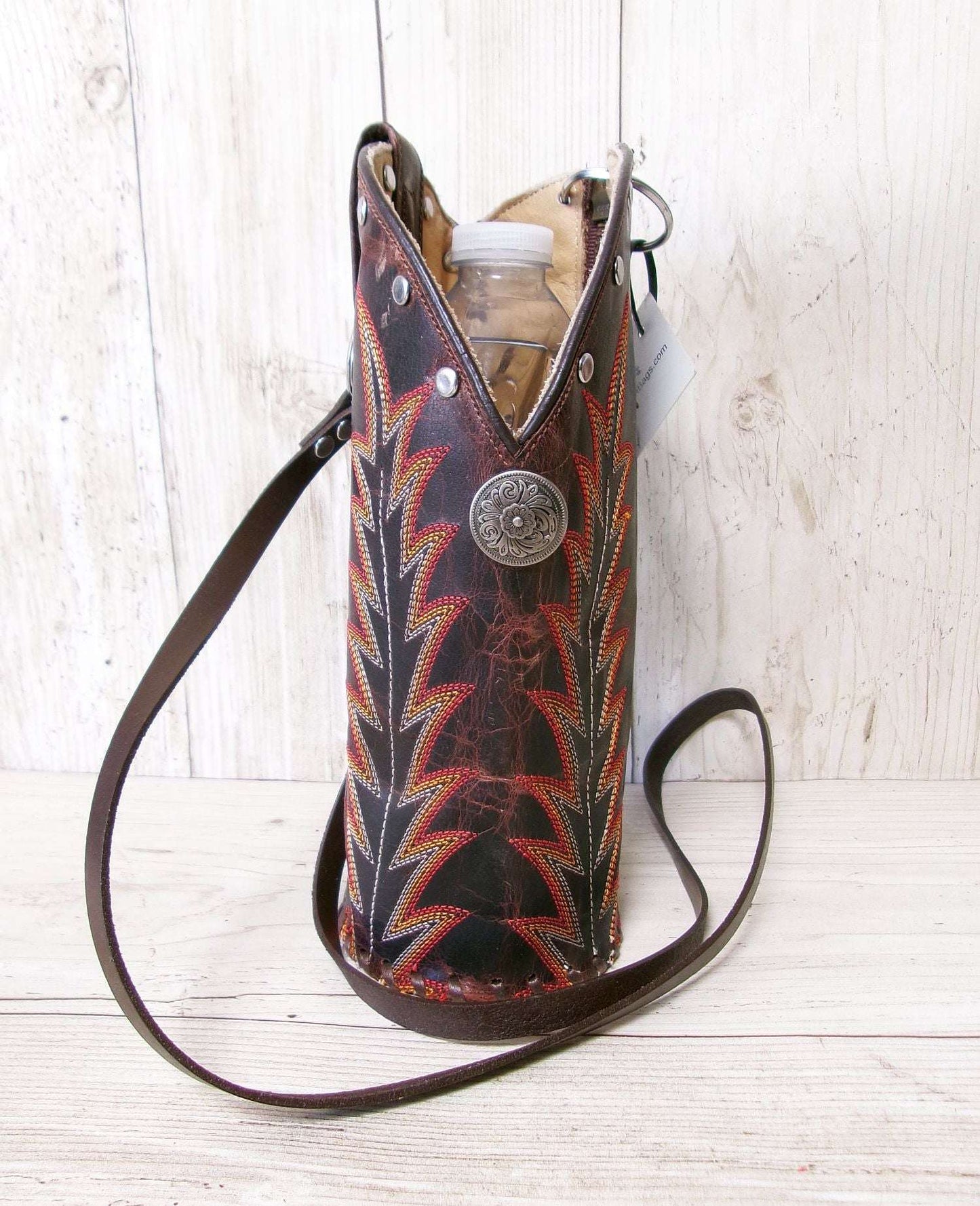 Cowboy Boot Wine Water Tote WA54 handcrafted from cowboy boots. Shop Wine Carrier Bags at ChrisThompsonBags.com and buy the best ["Bottle","Caddy","Crossbody","Holder","Tote","Water","Wine"] at Chris Thompson Bags.