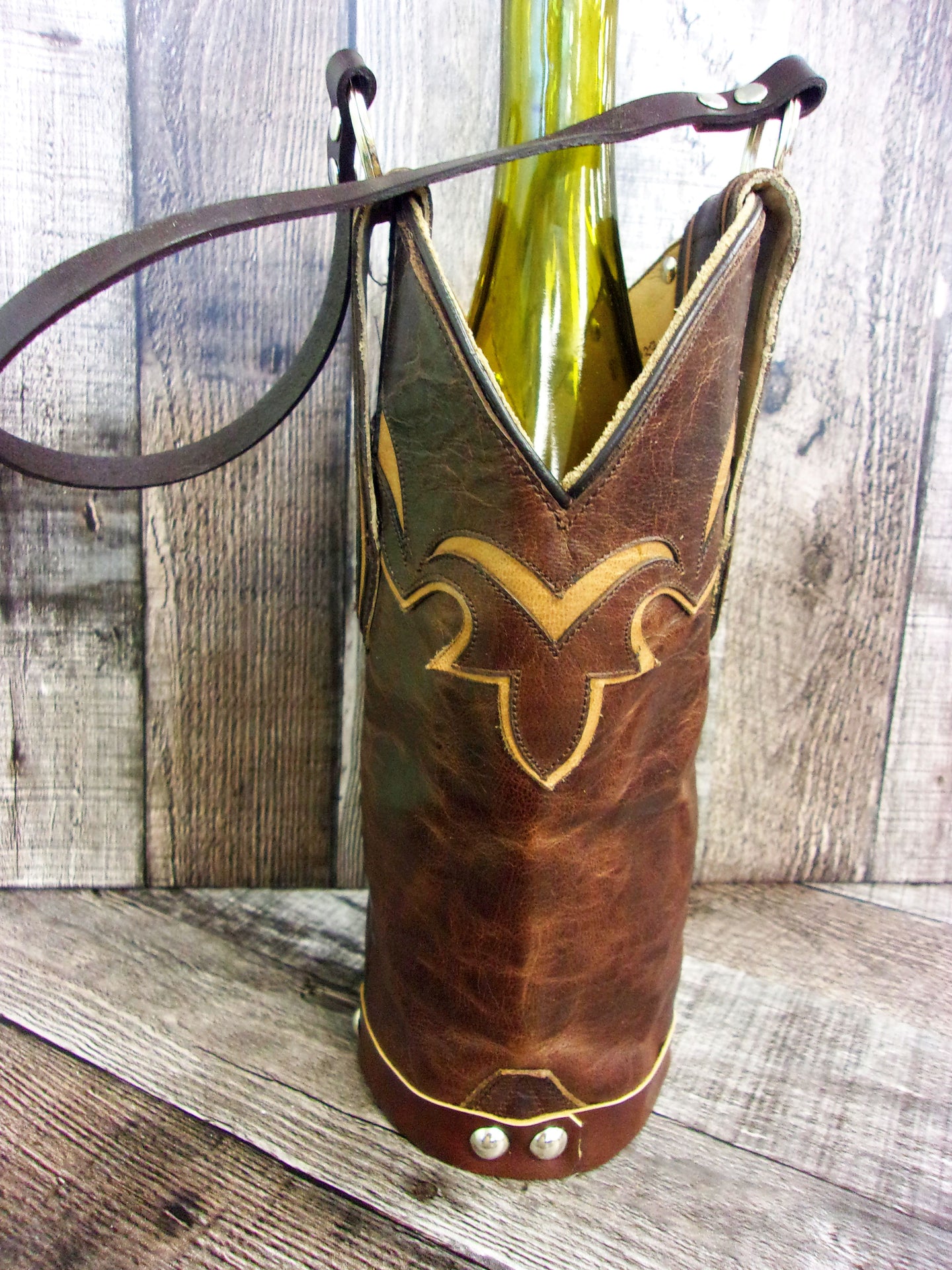 Cowboy Boot Wine Tote wt837 handcrafted from cowboy boots. Shop Wine Carrier Bags at ChrisThompsonBags.com and buy the best country bridesmaid, country centerpiece, country wedding, cowboy gift, cowgirl centerpiece, cowgirl gift, cowgirl wine bag, rodeo party bag, rustic wine carrier, unique western gift, western wine tote, wine lovers gift at Chris Thompson Bags.