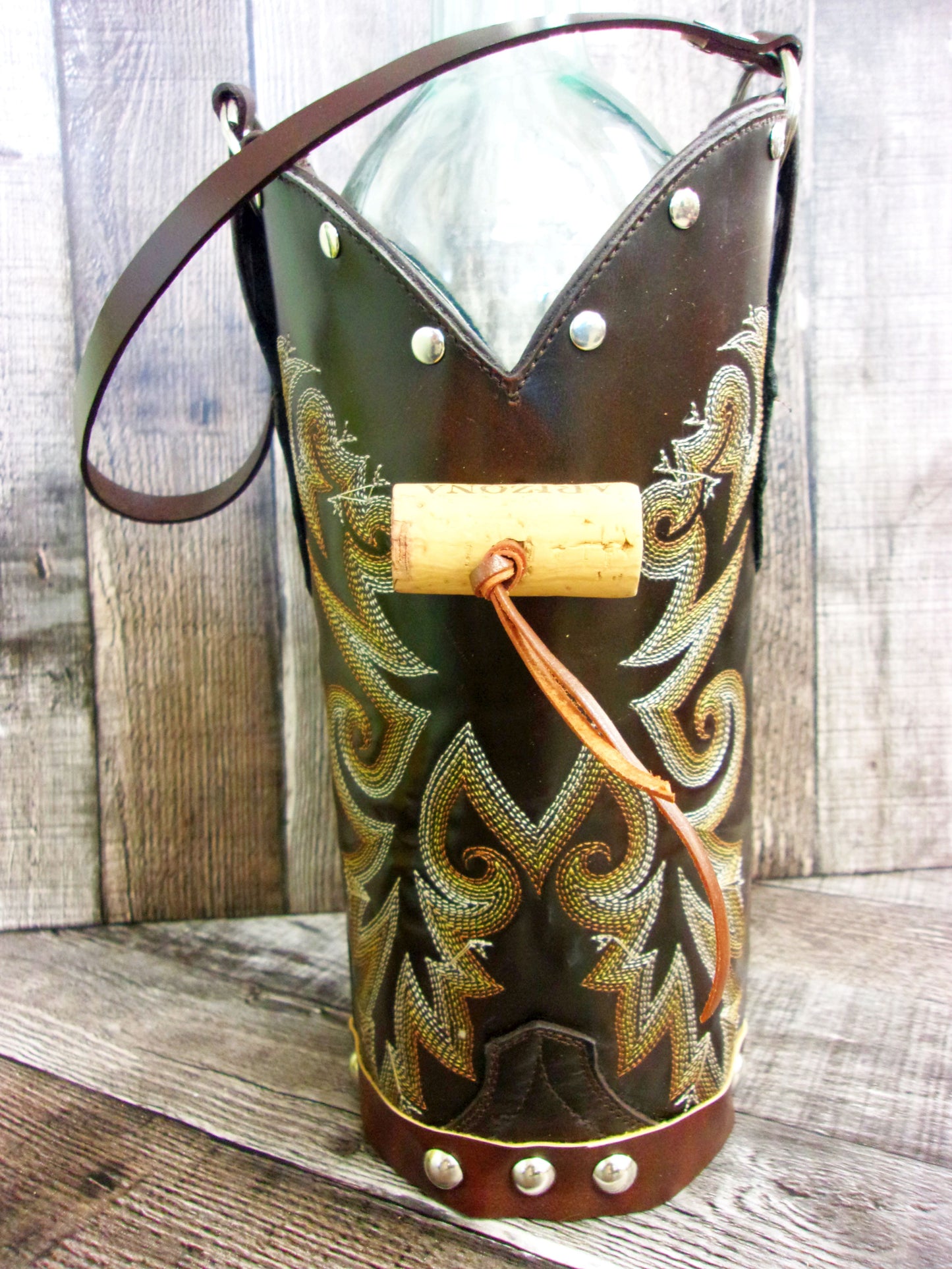 Cowboy Boot Wine Tote wt839 handcrafted from cowboy boots. Shop Wine Carrier Bags at ChrisThompsonBags.com and buy the best country bridesmaid, country centerpiece, country wedding, cowboy gift, cowgirl centerpiece, cowgirl gift, cowgirl wine bag, rodeo party bag, rustic wine carrier, unique western gift, western wine tote, wine lovers gift at Chris Thompson Bags.