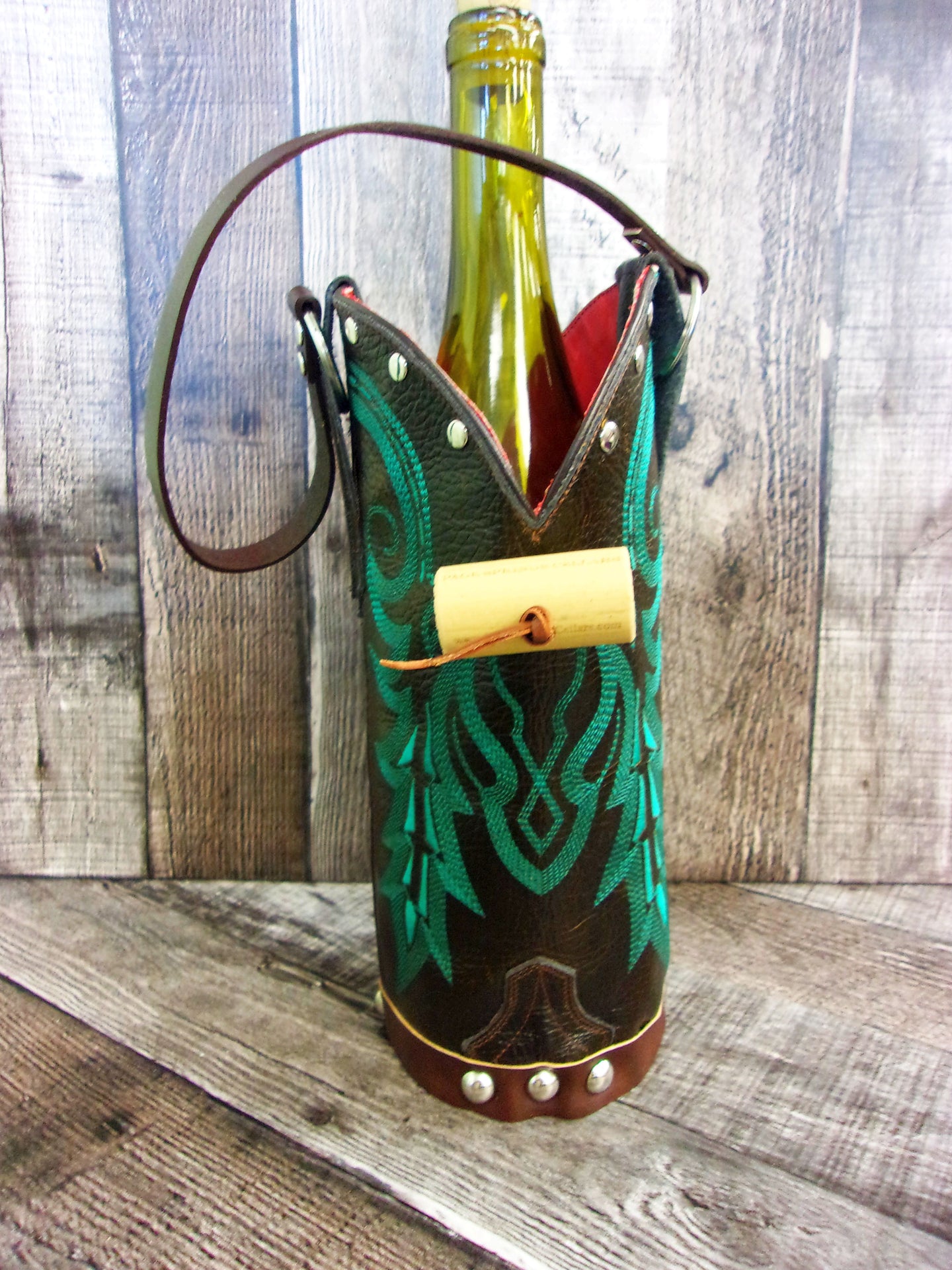 Cowboy Boot Wine Tote wt842 handcrafted from cowboy boots. Shop Wine Carrier Bags at ChrisThompsonBags.com and buy the best country bridesmaid, country centerpiece, country wedding, cowboy gift, cowgirl centerpiece, cowgirl gift, cowgirl wine bag, rodeo party bag, rustic wine carrier, unique western gift, western wine tote, wine lovers gift at Chris Thompson Bags.