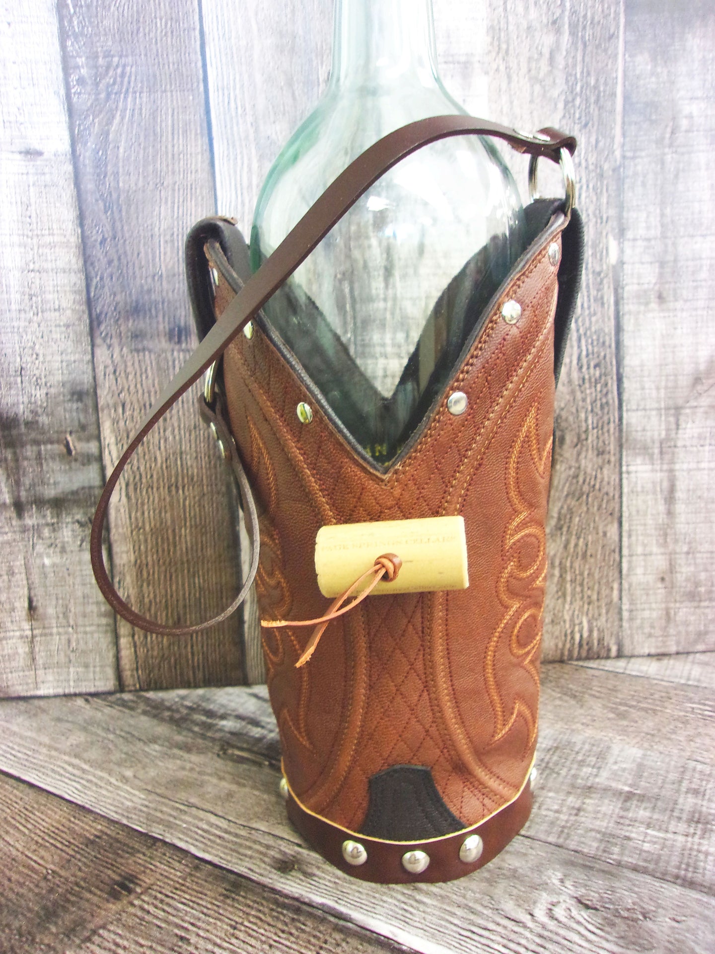 Cowboy Boot Wine Tote wt849 handcrafted from cowboy boots. Shop Wine Carrier Bags at ChrisThompsonBags.com and buy the best country bridesmaid, country centerpiece, country wedding, cowboy gift, cowgirl centerpiece, cowgirl gift, cowgirl wine bag, rodeo party bag, rustic wine carrier, unique western gift, western wine tote, wine lovers gift at Chris Thompson Bags.