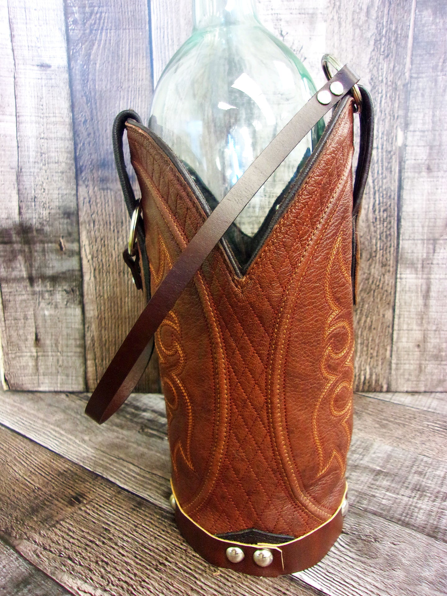 Cowboy Boot Wine Tote wt849 handcrafted from cowboy boots. Shop Wine Carrier Bags at ChrisThompsonBags.com and buy the best country bridesmaid, country centerpiece, country wedding, cowboy gift, cowgirl centerpiece, cowgirl gift, cowgirl wine bag, rodeo party bag, rustic wine carrier, unique western gift, western wine tote, wine lovers gift at Chris Thompson Bags.