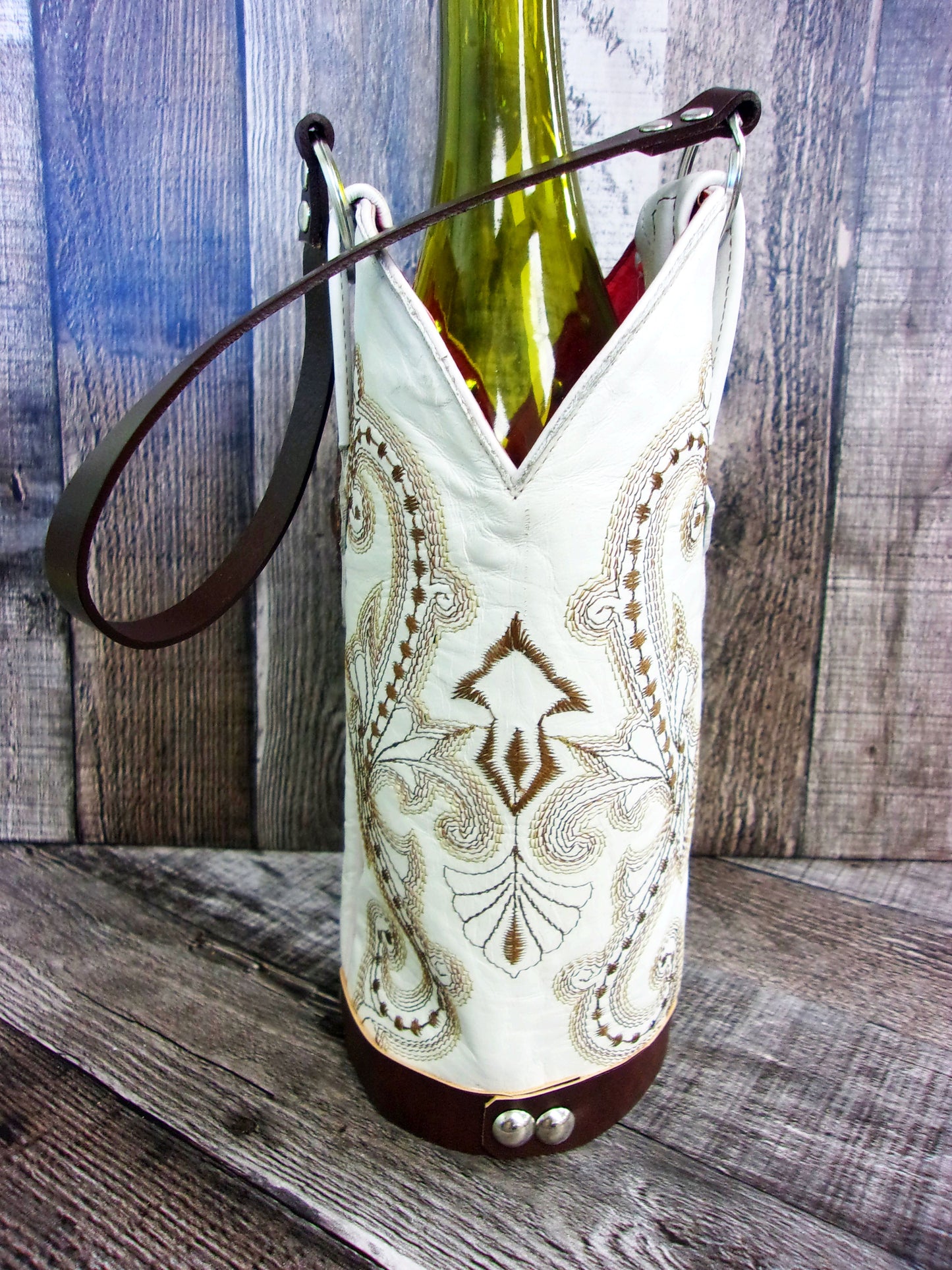 Cowboy Boot Wine Tote wt852 handcrafted from cowboy boots. Shop Wine Carrier Bags at ChrisThompsonBags.com and buy the best country bridesmaid, country centerpiece, country wedding, cowboy gift, cowgirl centerpiece, cowgirl gift, cowgirl wine bag, rodeo party bag, rustic wine carrier, unique western gift, western wine tote, wine lovers gift at Chris Thompson Bags.