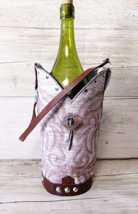 Wine bottle in a decorative holder on a wooden surface