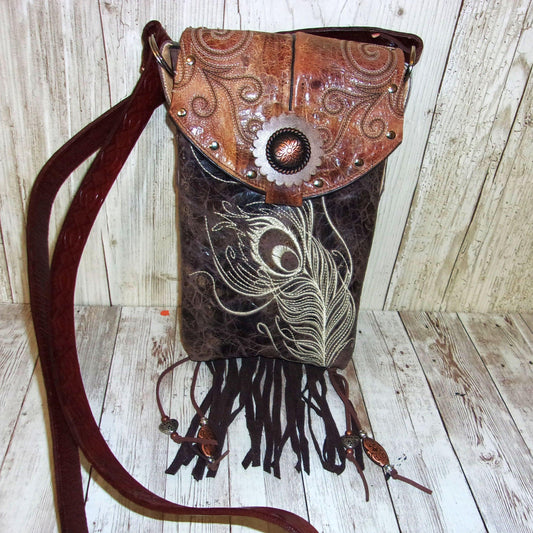 Small Concealed Carry Purse with Fringe CB115 handcrafted from cowboy boots. Shop Handbags at ChrisThompsonBags.com and buy the best 2nd amendment, conceal carry purse, concealed carry, concealed for her, concealedcarry purse, cowboy boot purse, cowgirl concealed, handgun bag, leather conceal bag, unique concealed, western conceal, western concealed at Chris Thompson Bags.